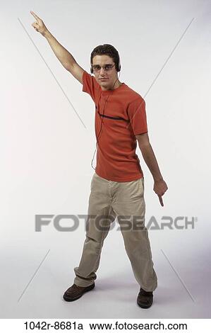 Stock Image - people, headset, male, listening, music, dancing, dance. Fotosearch