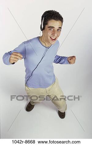 people, headset, male, listening, music, dancing, dance View Large Photo Image Stock Photo - people, headset, male, listening, music, dancing, dance. Fotosearch