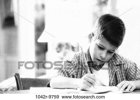 people, homework, studying, boy, writing, child, education View Large Photo Image Stock Photo - people, homework, studying, boy, writing, child, education. Fotosearch