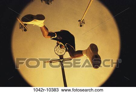 Stock Image - people, jump, jumping, outdoors, basketball, player. Fotosearch