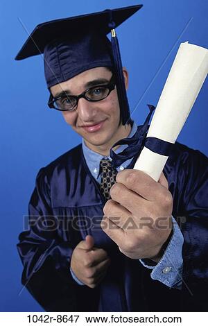 people, male, achievement, cap, education, student, graduation View Large Photo Image Stock Photo - people, male, achievement, cap, education, student, graduation. Fotosearch