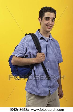 people, male, backpack, carrying, brunette, indoors View Large Photo Image Stock Image - people, male, backpack, carrying, brunette, indoors. Fotosearch