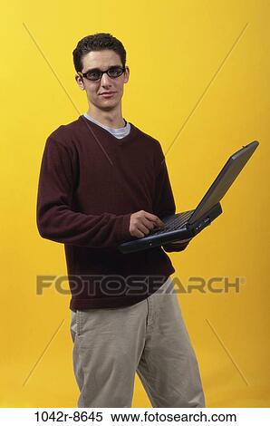 Stock Photography - people, male, eyeglasses, computer, laptop, using. Fotosearch