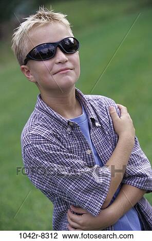 Stock Image - people, male, sunglasses, boy, outdoors, child, blond. Fotosearch