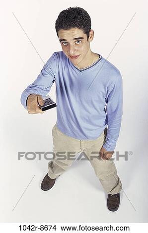 Picture - people, male, watch, watching, television, brunette. Fotosearch