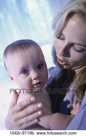 Stock Image - people, mother, crying, frustrated, family, careful, parent. Fotosearch