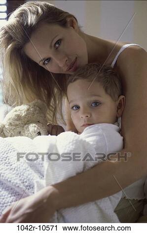 Stock Image - people, mother, hugging, family, blond, hug. Fotosearch
