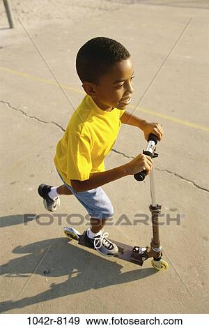 Stock Photo - people, playing, boy, outdoors, child, play, African-American. Fotosearch