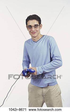 people, playing, male, eyeglasses, play, game, brunette View Large Photo Image Stock Image - people, playing, male, eyeglasses, play, game, brunette. Fotosearch