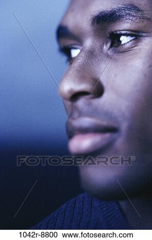 Stock Image - people, profile, face, indoors, headshot, African-American. Fotosearch
