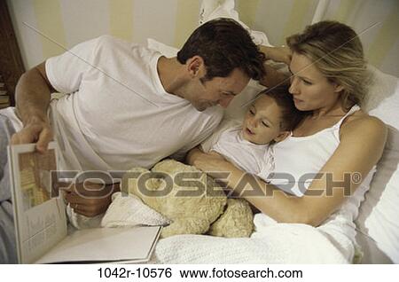 people, reading, bed, book, family View Large Photo Image Stock Photograph - people, reading, bed, book, family. Fotosearch