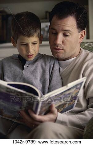 people, reading, book, family, father, brunette View Large Photo Image Stock Photo - people, reading, book, family, father, brunette. Fotosearch