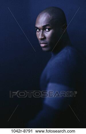 people, serious, indoors, African-American, young adult, Young men indoors View Large Photo Image Stock Image - people, serious, indoors, African-American, young adult, Young men indoors. Fotosearch