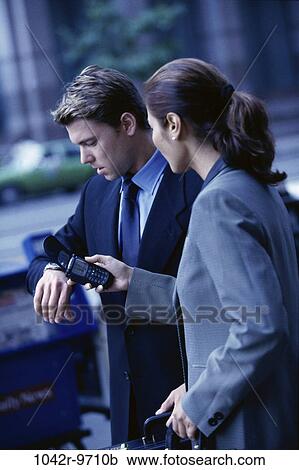 people, time, rush, phone, watch, street, business View Large Photo Image Stock Image - people, time, rush, phone, watch, street, business. Fotosearch