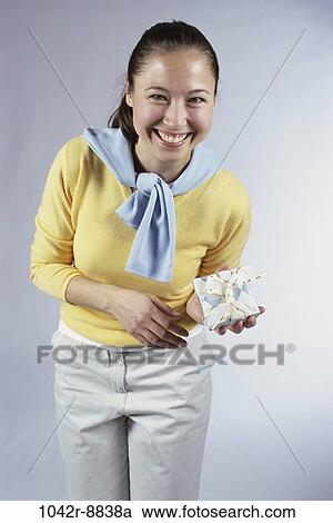 people, woman, Asian, birthday, present, brunette, indoors View Large Photo Image Stock Image - people, woman, Asian, birthday, present, brunette, indoors. Fotosearch
