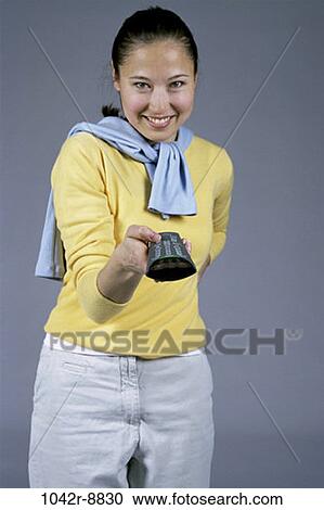 people, woman, Asian, watch, watching, television, remote View Large Photo Image Stock Image - people, woman, Asian, watch, watching, television, remote. Fotosearch