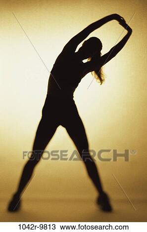 people, woman, healthy, stretching, silhouette, health, sports View Large Photo Image Stock Image - people, woman, healthy, stretching, silhouette, health, sports. Fotosearch