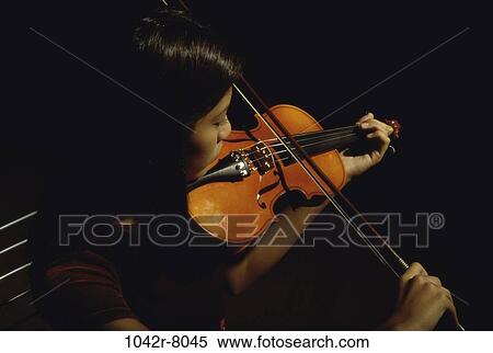 Stock Photography - people, woman, playing, violin, play, musical, indoors. Fotosearch