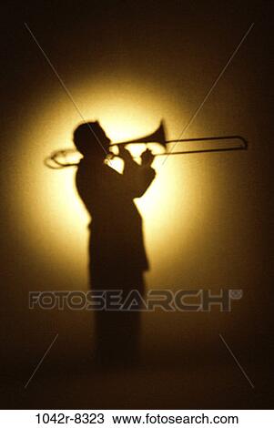 Stock Image - playing, music, silhouette, arts, entertainment, play, vignette. Fotosearch