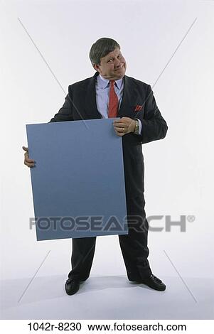 presentation, business, Middle-aged, sign, humor, businessman View Large Photo Image Stock Image - presentation, business, Middle-aged, sign, humor, businessman. Fotosearch