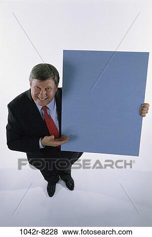 presentation, business, Middle-aged, sign, businessman, indoors View Large Photo Image Stock Photo - presentation, business, Middle-aged, sign, businessman, indoors. Fotosearch