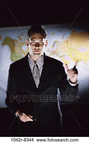 Picture - presentation, Hispanic, business, meetings, businessman, indoors. Fotosearch