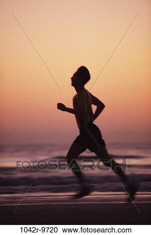 running, sunset, beach, jogging, silhouette, health View Large Photo Image Stock Image - running, sunset, beach, jogging, silhouette, health. Fotosearch