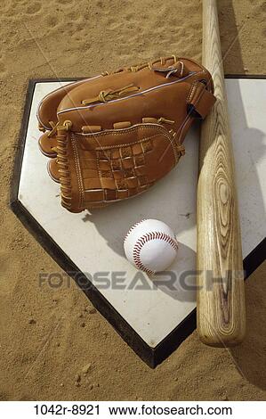 Stock Image - sand, bat, baseball bat, ball, baseball, sports, glove. Fotosearch