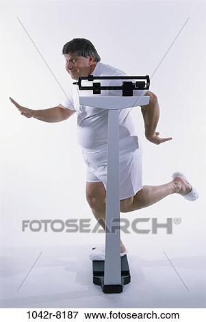 scales, people, diet, individuality, Middle-aged, joyous View Large Photo Image Stock Photo - scales, people, diet, individuality, Middle-aged, joyous. Fotosearch