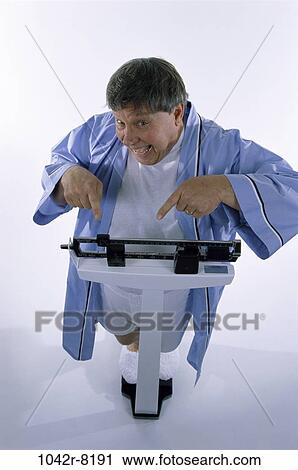 scales, people, morning, success, diet, pointing View Large Photo Image Stock Image - scales, people, morning, success, diet, pointing. Fotosearch