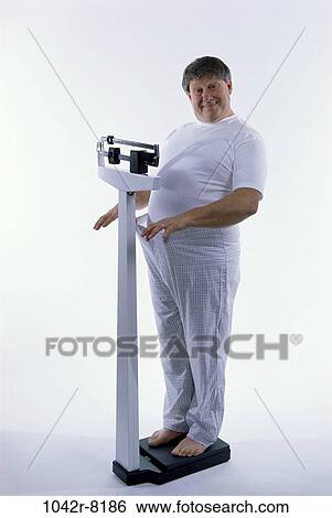 scales, people, success, diet, achievement, Middle-aged View Large Photo Image Stock Photograph - scales, people, success, diet, achievement, Middle-aged. Fotosearch