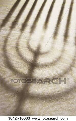 shadow, religion, Judaism, still life, inspiration, holiday, menorah View Large Photo Image Stock Image - shadow, religion, Judaism, still life, inspiration, holiday, menorah. Fotosearch