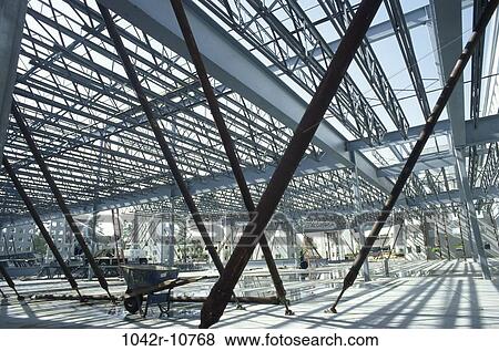 shadows, industry, construction, suburban, building, wheelbarrow View Large Photo Image Stock Photo - shadows, industry, construction, suburban, building, wheelbarrow. Fotosearch