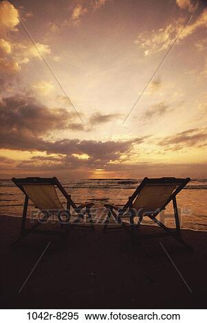 Stock Photography - sky, clouds, ocean, sunset, beach, waves, tranquility. Fotosearch
