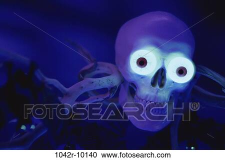 spooky, eyes, bat, glowing, Halloween, skull, eerie View Large Photo Image Stock Image - spooky, eyes, bat, glowing, Halloween, skull, eerie. Fotosearch