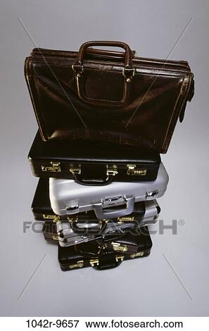 stacked, business, business still life, still life, piled, travel, briefcases View Large Photo Image Stock Photo - stacked, business, business still life, still life, piled, travel, briefcases. Fotosearch