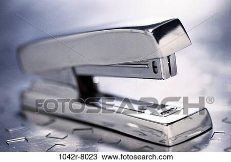 stapler, silver, modern, business, sleek, still life View Large Photo Image Stock Image - stapler, silver, modern, business, sleek, still life. Fotosearch