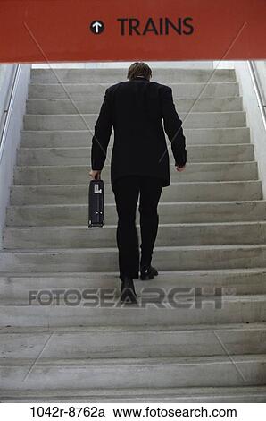 Stock Image - steps, stairs, briefcase, back, train, business. Fotosearch