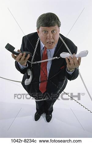 Stock Image - stress, business, challenges, chaotic, Middle-aged, frustrated. Fotosearch