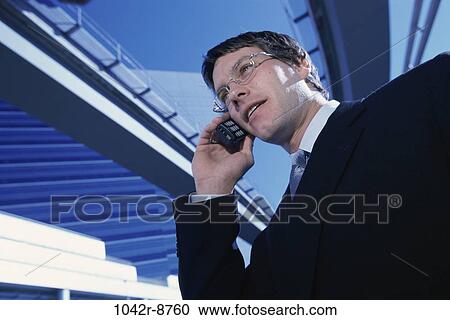 talking, eyeglasses, phone, business, outdoors, cell phone View Large Photo Image Stock Image - talking, eyeglasses, phone, business, outdoors, cell phone. Fotosearch