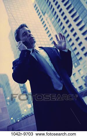 talking, phone, city, business, outdoors, skyscrapers View Large Photo Image Stock Image - talking, phone, city, business, outdoors, skyscrapers. Fotosearch