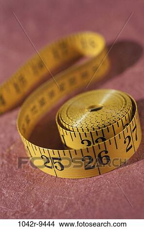 Picture - tool, accuracy, still life, measure, tape measure, measuring tape, length. Fotosearch