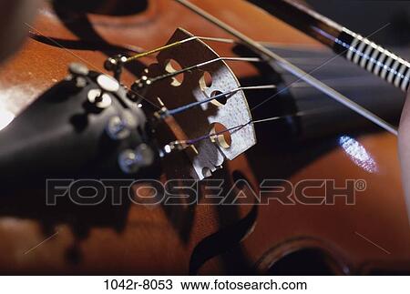 Stock Image - violin, arts, entertainment, still life, bow, musical, instrument. Fotosearch