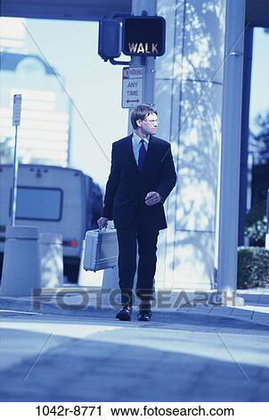 walking, briefcase, business, outdoors, Middle-aged View Large Photo Image Stock Image - walking, briefcase, business, outdoors, Middle-aged. Fotosearch