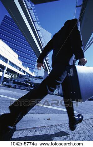 walking, briefcase, business, outdoors, transportation View Large Photo Image Stock Image - walking, briefcase, business, outdoors, transportation. Fotosearch