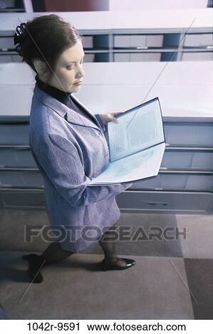 woman, business, cabinets, indoors, files, Caucasian, businesswoman View Large Photo Image Stock Image - woman, business, cabinets, indoors, files, Caucasian, businesswoman. Fotosearch