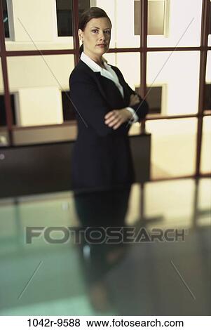 woman, business, Middle-aged, serious, indoors, confidence, executive View Large Photo Image Stock Photo - woman, business, Middle-aged, serious, indoors, confidence, executive. Fotosearch