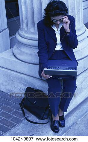 woman, eyeglasses, computer, laptop, business, outdoors, Middle-aged View Large Photo Image Stock Photo - woman, eyeglasses, computer, laptop, business, outdoors, Middle-aged. Fotosearch