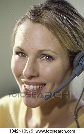 Stock Photo - woman, headset, business, blond, customer service, headshot. Fotosearch