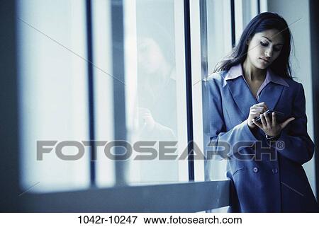 woman, Hispanic, computer, business, indoors, businesswoman, PDA View Large Photo Image Stock Photo - woman, Hispanic, computer, business, indoors, businesswoman, PDA. Fotosearch
